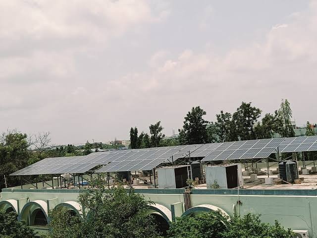 Solar company website shown on a laptop
